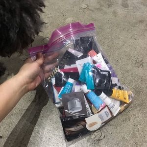 Giant ziploc full of sample and travel sizes